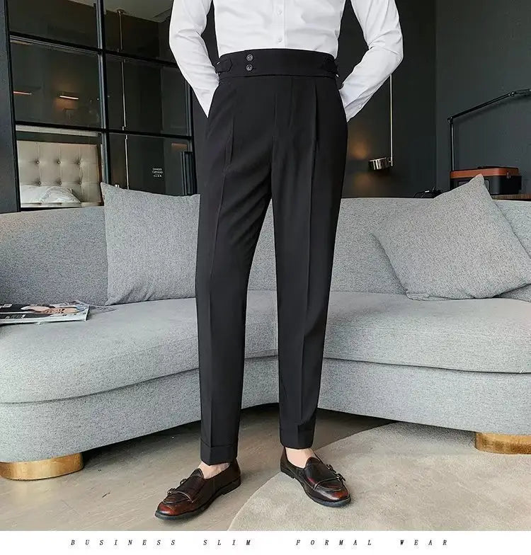Black slim-fit Korean style men trousers featuring a high waist and pleats, crafted from smooth formal fabric.