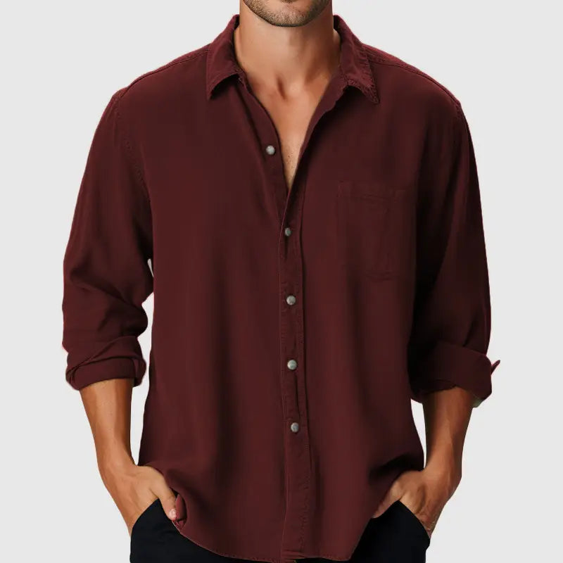 A men’s slim fit maroon button-down linen blend casual shirt with rolled-up sleeves and a classic collar.
