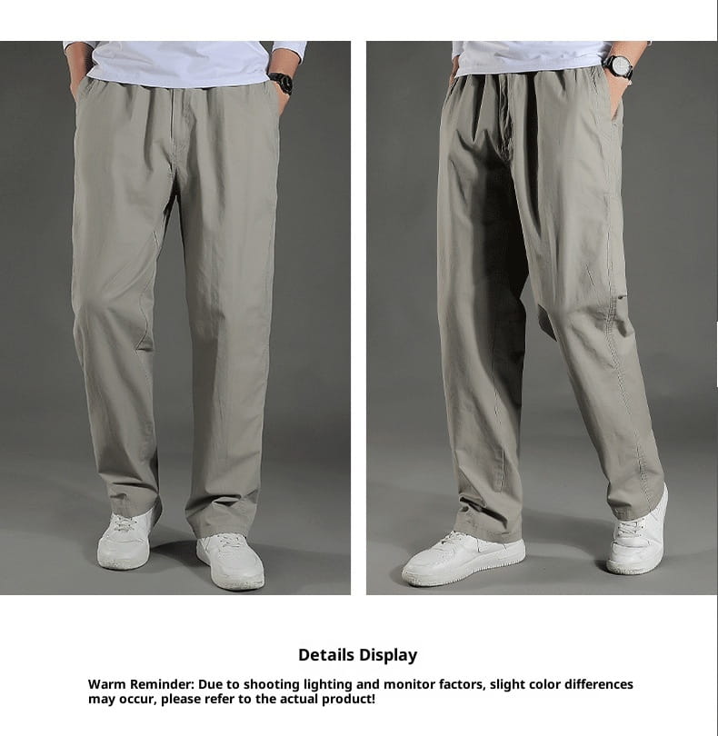 Beige relaxed-fit men’s Japanese style cotton straight leg workwear pants with elastic waistband and side pockets.