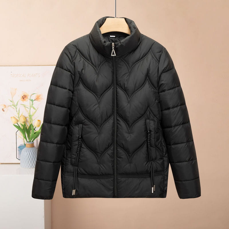 Black quilted puffer jacket women winter coat with a high collar and chevron stitching pattern.