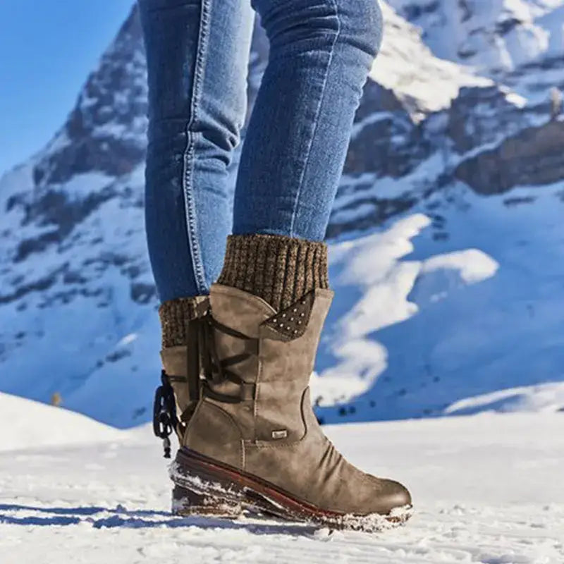 Brown suede ankle boot with knitted cuff and decorative studs designed as women winter snow boots suede mid calf Martin shoes.