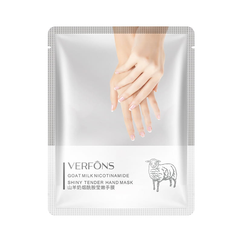 Máscara de manos con leche de cabra y niacinamida, crema hidratante y blanqueadora, envasada en plata y blanco con un diseño minimalista que presenta una ilustración de un cordero.