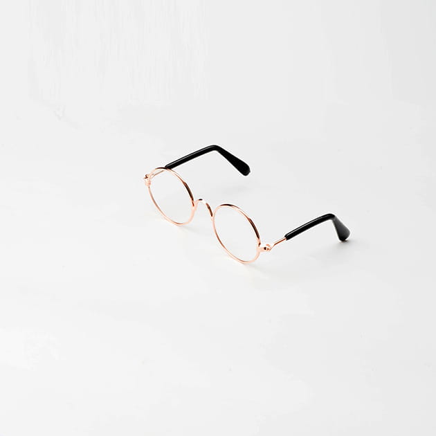 Round-framed sunglasses with rose gold metal rims and black temple arms featuring mirrored lenses.