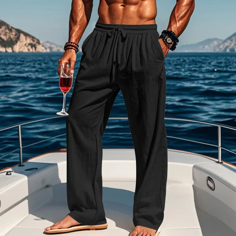 Men’s black linen joggers casual drawstring pants with a relaxed loose fit suitable for swimwear.