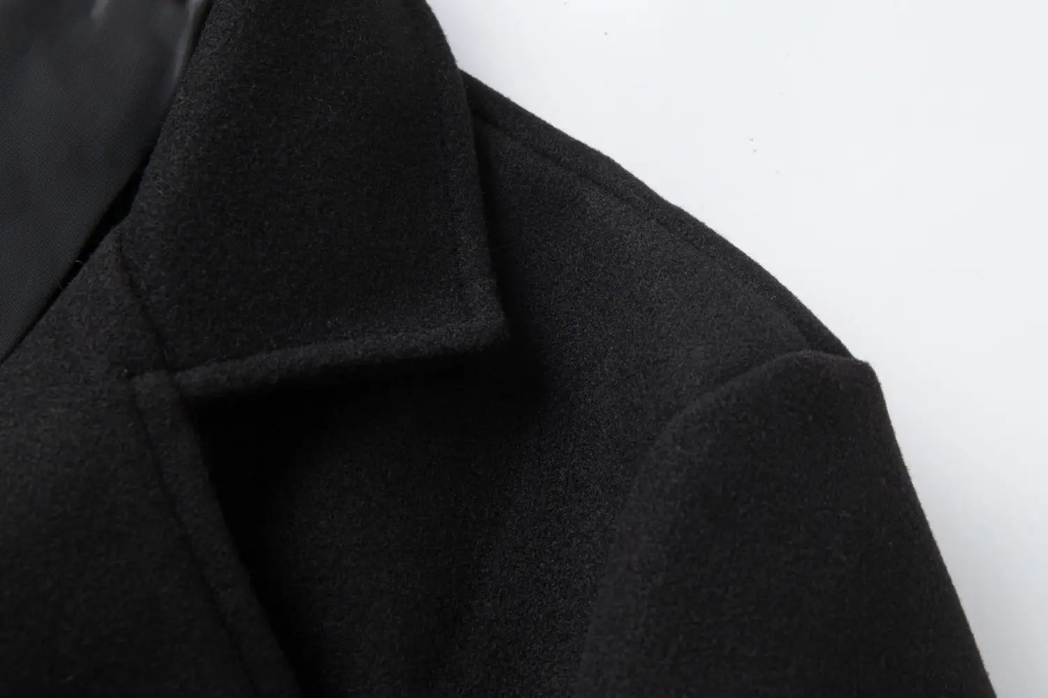 men double breasted wool overcoat with a black wool coat collar featuring a smooth structured design