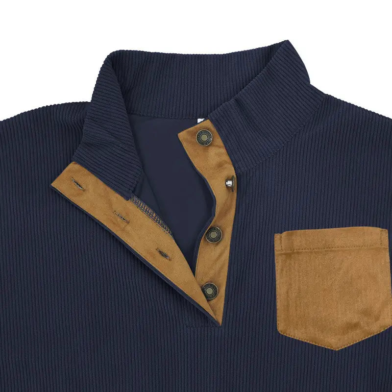 Navy blue slim fit corduroy pullover with tan suede collar placket and pocket featuring contrast accents.