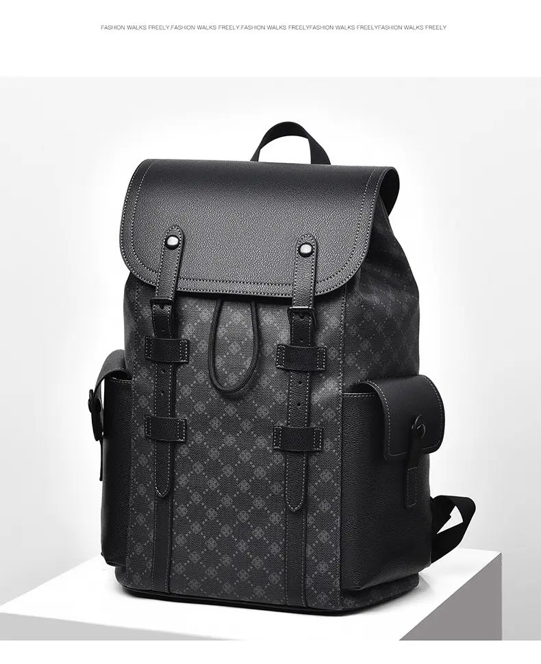 Men’s black leather business travel backpack with a subtle diamond-patterned panel, sturdy straps, and a laptop sleeve.