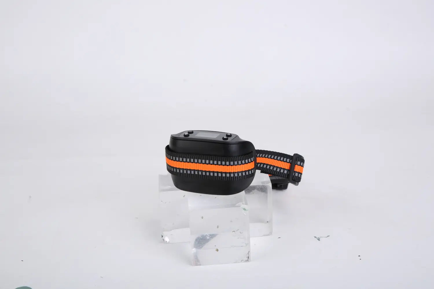 black and orange reflective waterproof dog collar with a compact electronic transmitter unit for gps wireless dog fence and tracking system