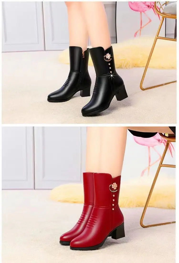 women’s leather martin boots in black and red featuring decorative floral brooch embellishments on the side