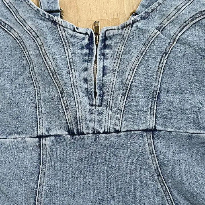Light-wash denim slim fit midi dress with square neck, central zipper, structured seams, and side slit.