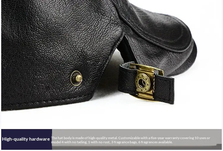 Black leather aviator-style hat with brass hardware and a buckle strap designed as a warm winter flat cap for men.