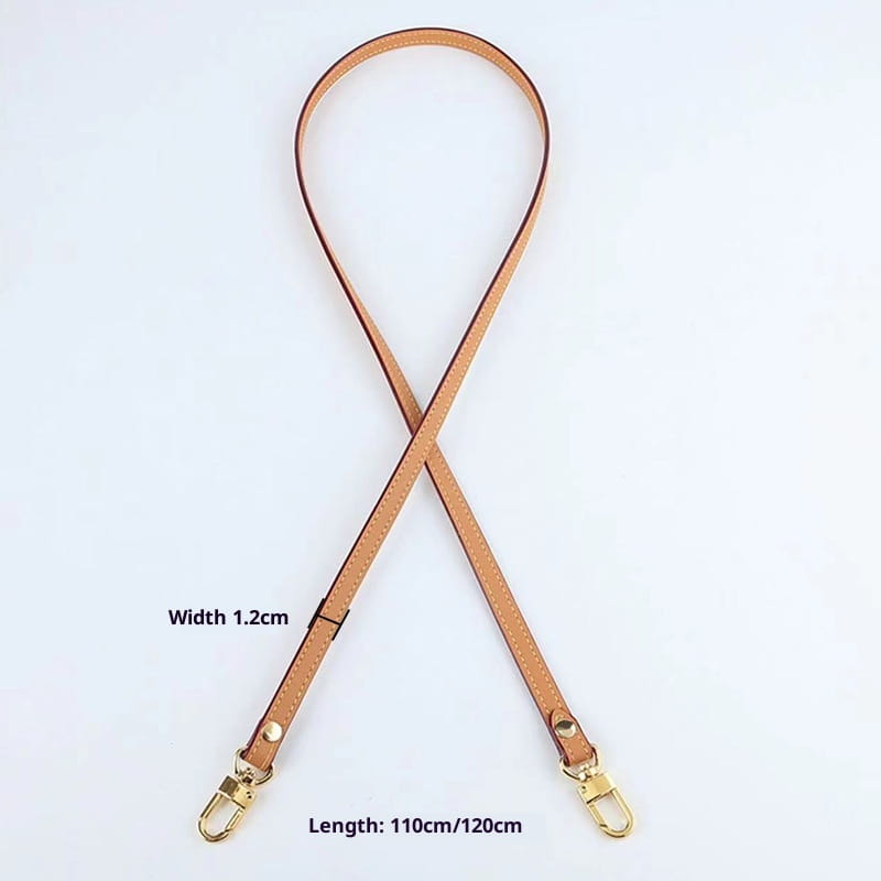 Leather replacement strap for crossbody bags made of tan leather with gold tone metal hardware and stitched edges.