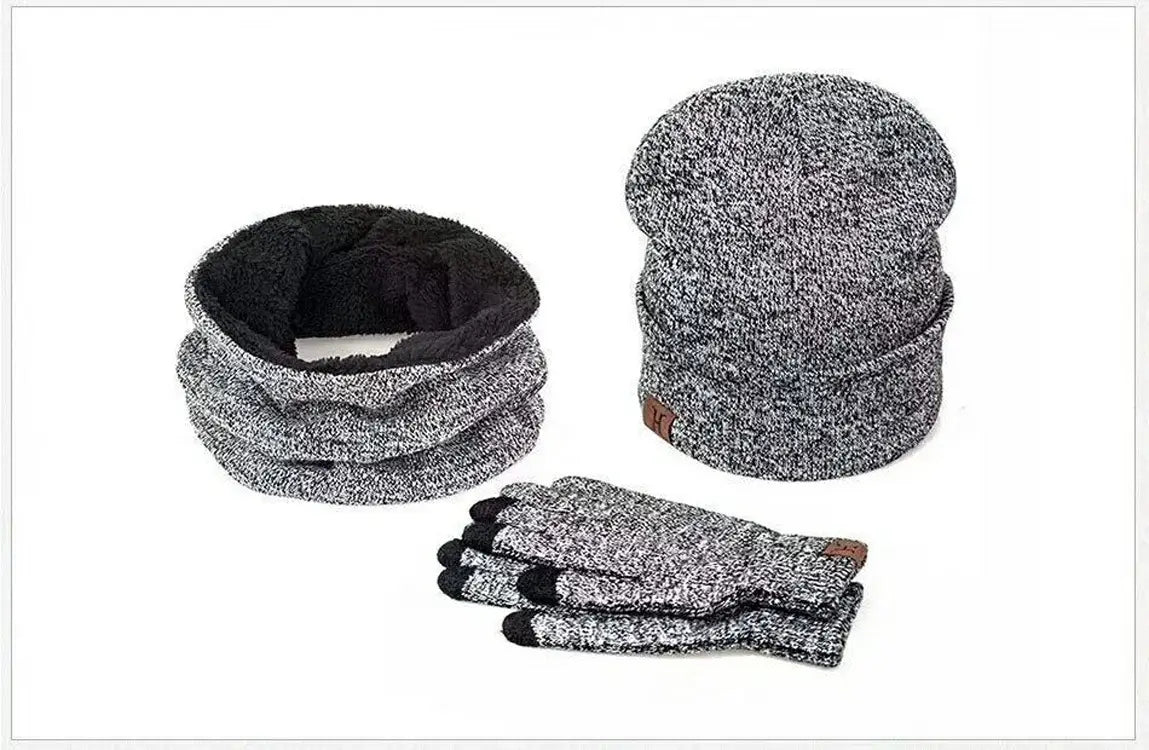 Gray speckled knit winter hat scarf and touchscreen gloves set features a beanie scarf and gloves with black fingertips designed for cold weather use.