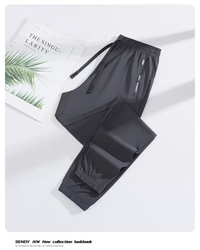 Black anti mosquito casual athletic trousers featuring elastic waistband with drawstring side zippers and ribbed cuffs designed for comfortable outdoor wear.