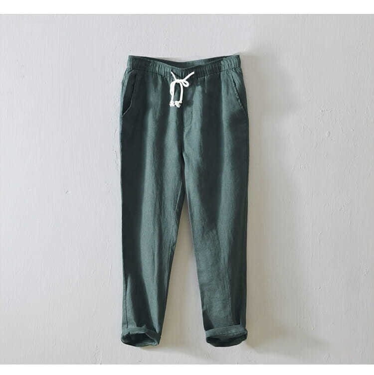 Herren-Casual-Hosen in Übergröße mit geradem Schnitt aus Leinen in Dunkelgrün mit weißem Kordelzugbund und umgeschlagenen Bündchen.