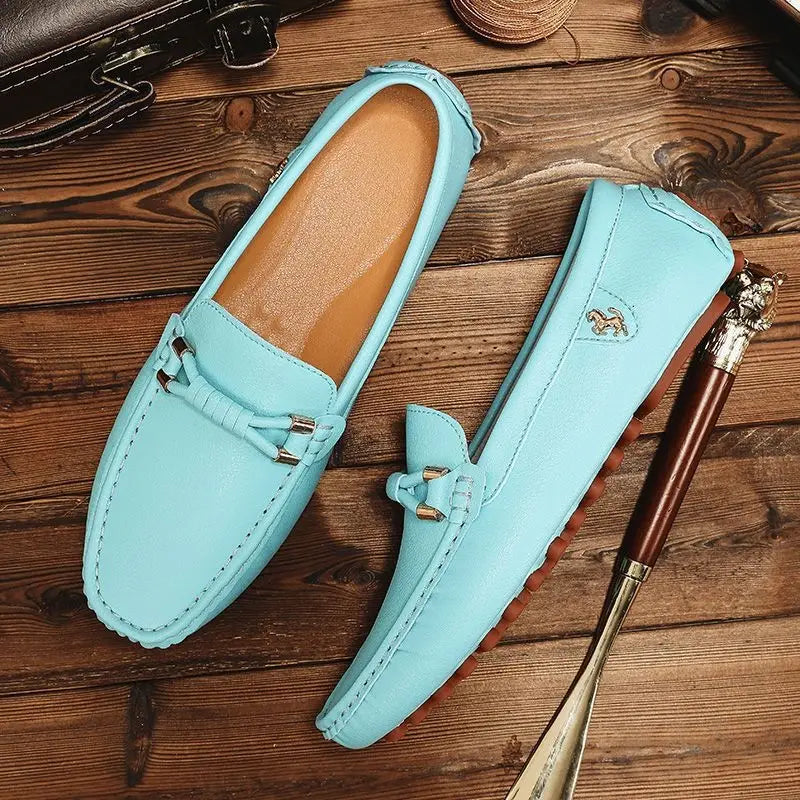 Light blue leather men’s plus size driving moccasin loafers with braided strap and metallic hardware.
