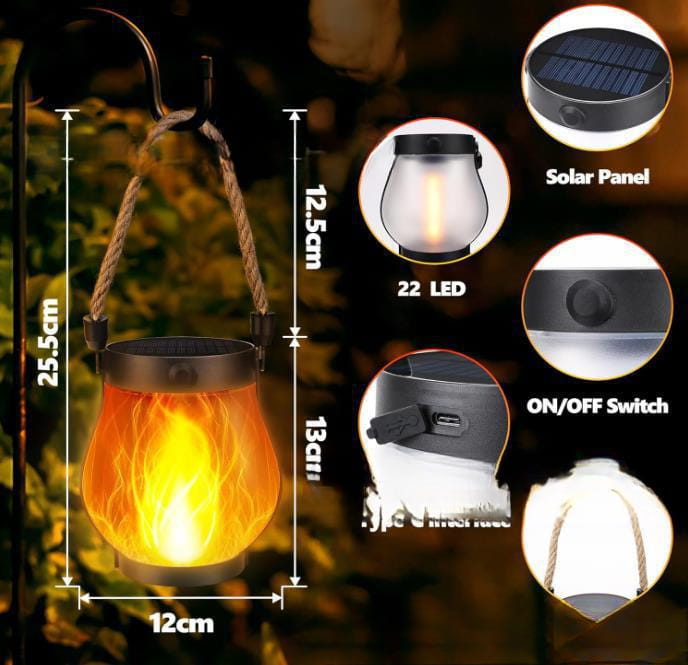 Orange flame effect solar lantern with a black metal frame and rope handle from the flickering flame garden lamp silver solar lanterns collection.