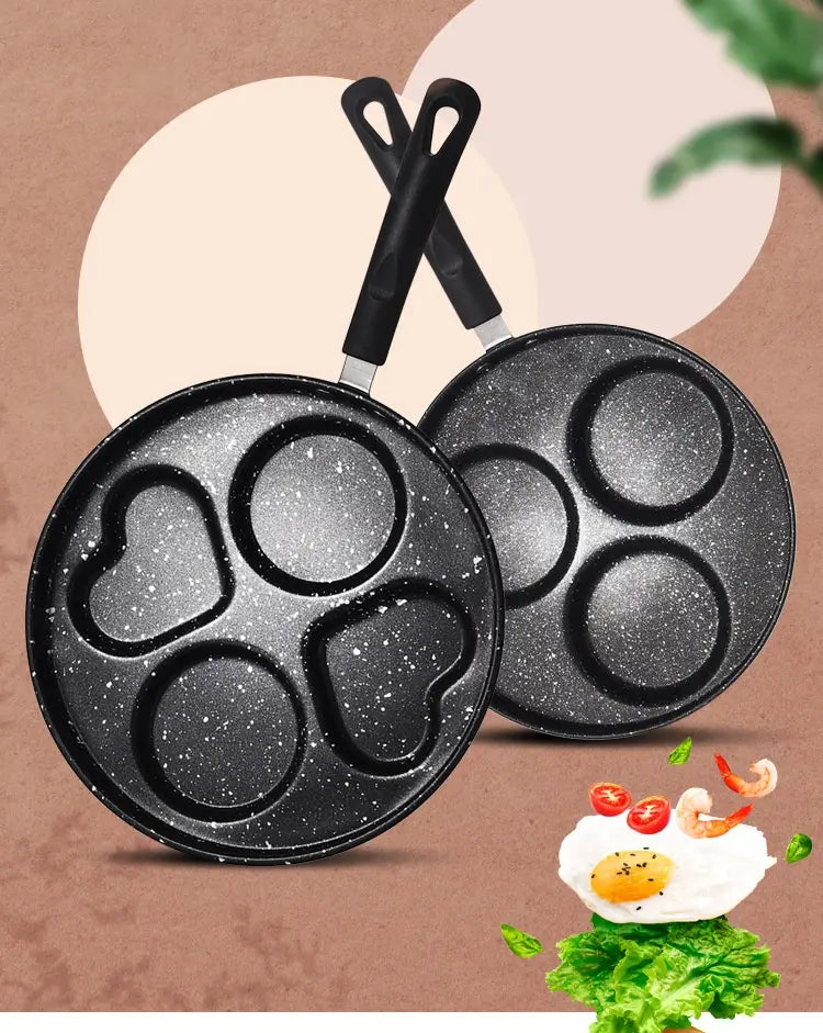 black speckled non-stick heart and circle-shaped egg pan with black handles made of medical stone measuring 25cm