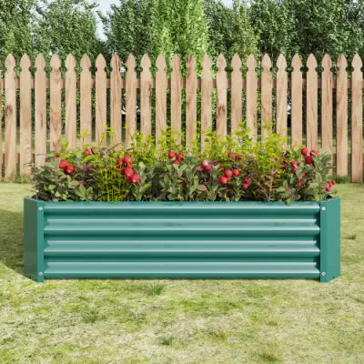 Maceta de jardín de metal corrugado color verde azulado, mostrada en un lecho elevado de jardín de 4x2x1 pies, maceta galvanizada plateada, con diseño para uso de jardinería al aire libre.