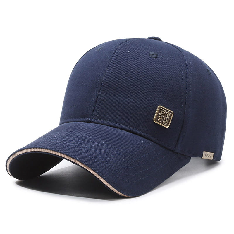Navy blue men outdoor baseball cap with beige trim along the brim and gold-tone square patch for sun protection.