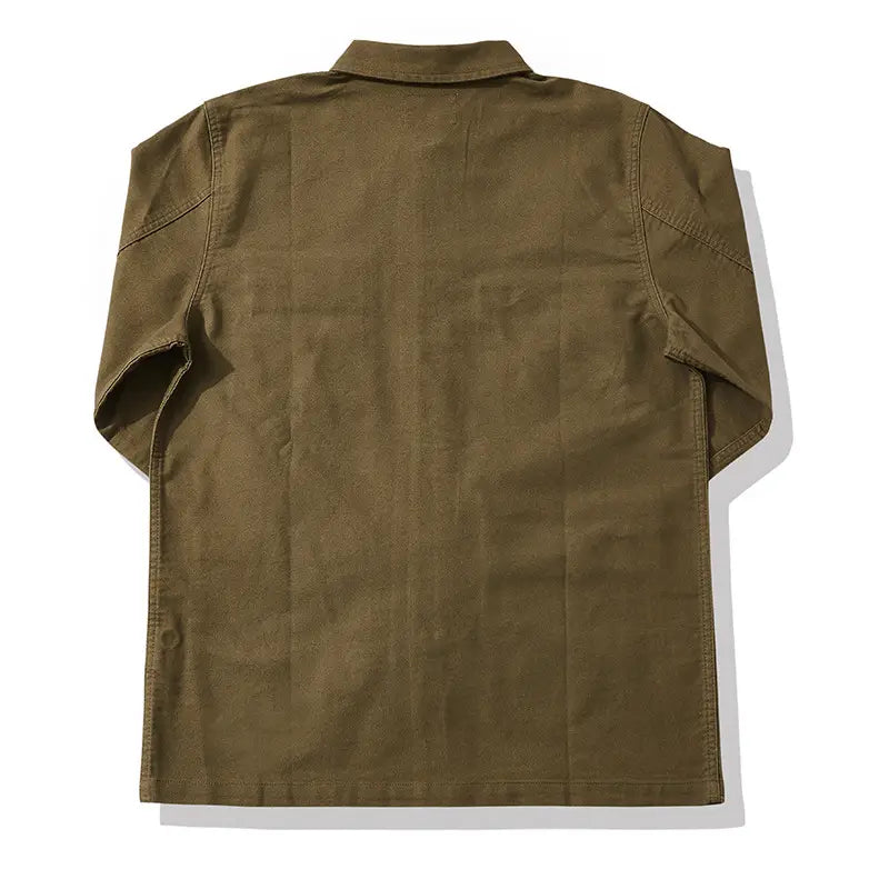 olive green canvas mens french workwear jacket with collar short sleeves and cotton utility pocket designed for durability and functionality