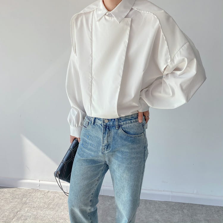 Men oversized long sleeve button up shirt in white featuring a structured collar and voluminous sleeves.