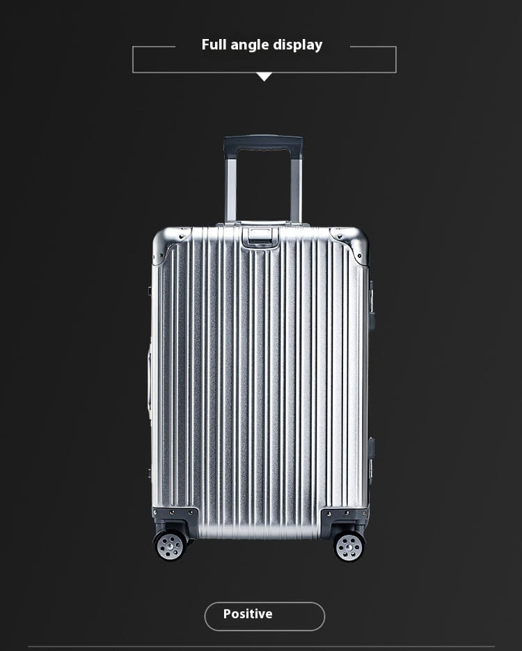 Silver aluminum magnesium luggage hardshell spinner suitcase with aluminum frame, vertical ribbed design, and black wheels.