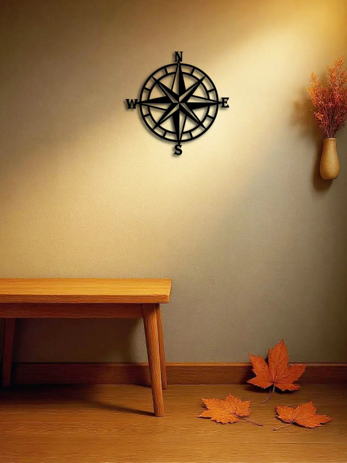 Black metal nautical compass wall art with cardinal direction markings measuring 11 inch ideal for nautical decor.