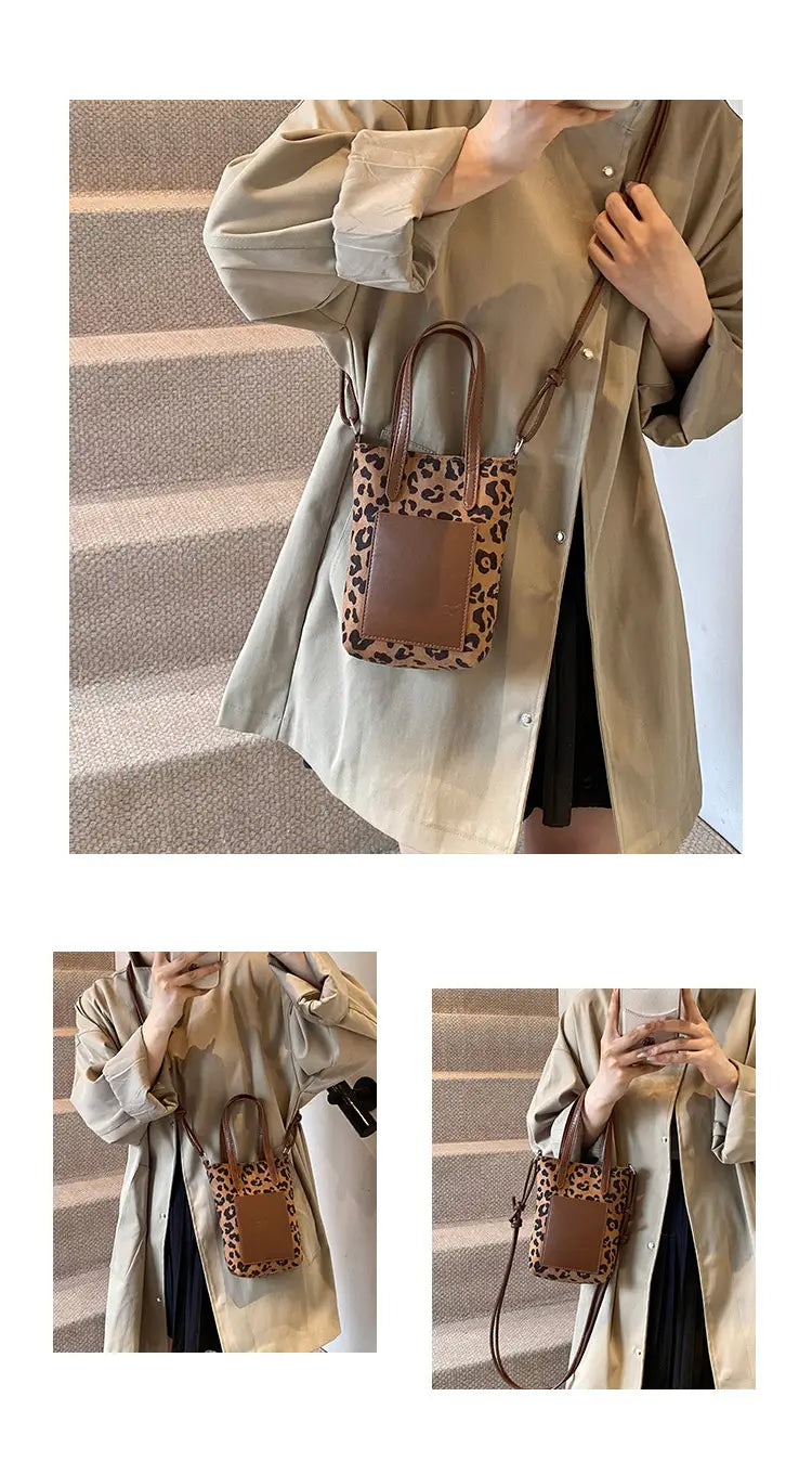 Retro leopard print suede mini bucket crossbody bag with brown leather accents and handles.