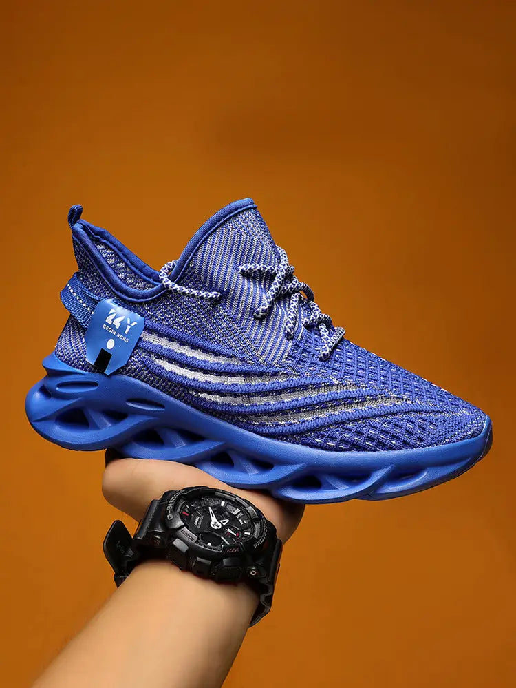 Blue flyknit mesh platform running shoe for men featuring a bold sculpted sole and matching laces.