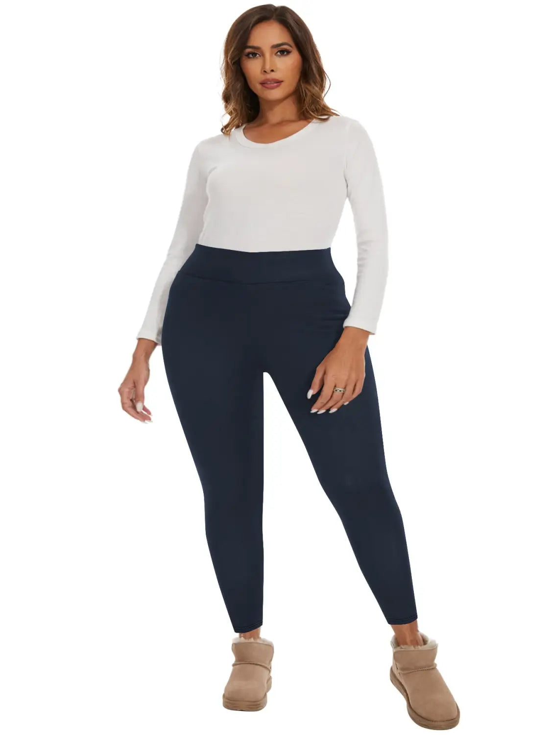 Navy blue high waisted winter leggings made of smooth stretchy fleece lined fabric with a sleek form fitting design.
