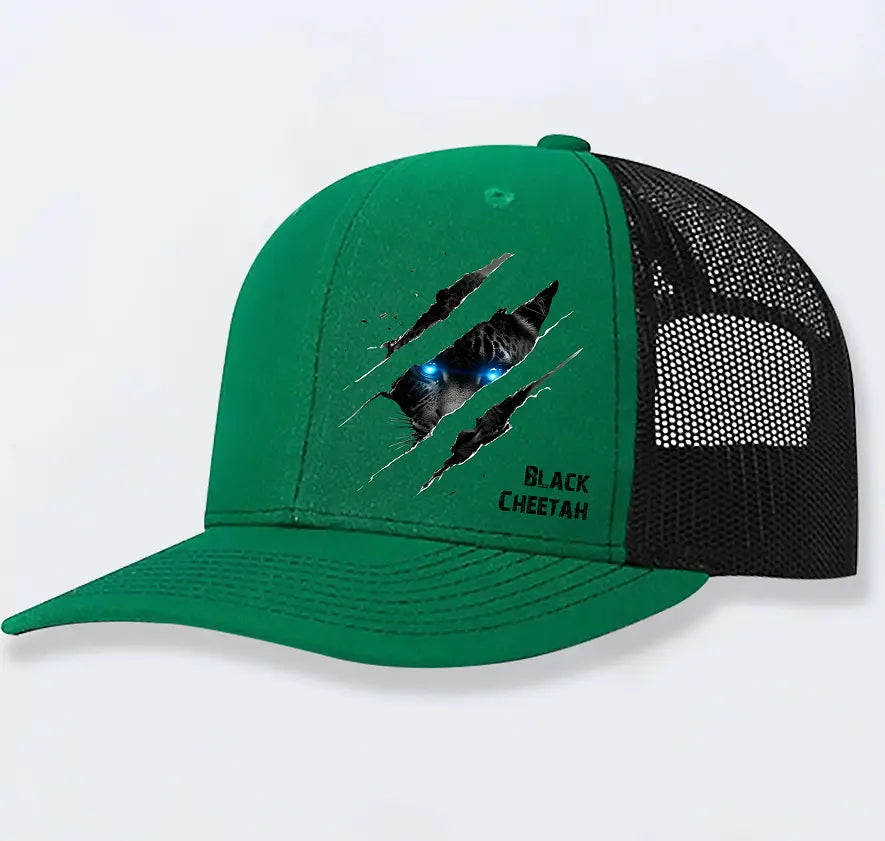 Green and black polyester cheetah graphic trucker hat for men featuring a black cheetah with glowing blue eyes emerging from torn fabric and bold black cheetah lettering.