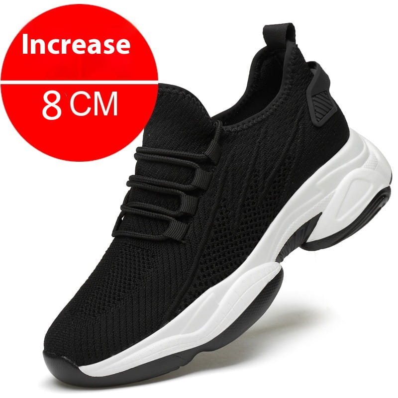 Men’s air cushion running shoes are black knit sneakers featuring a white and black chunky sole designed for enhanced comfort and style.