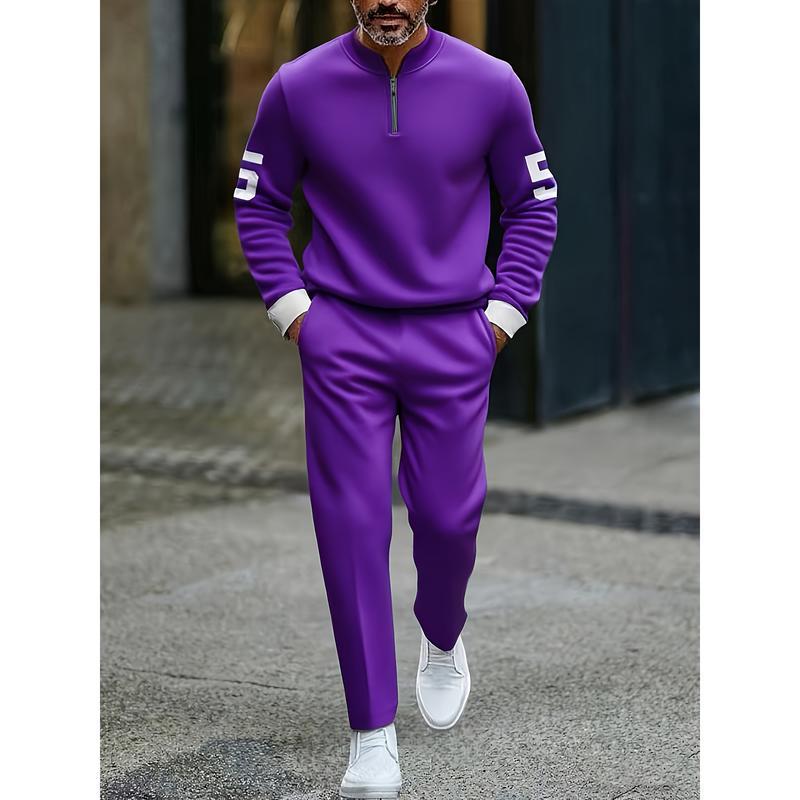 Purple half zip athletic sweatsuit printed set with white numerals on the sleeves, ribbed cuffs, a half-zip collar, and matching pants.