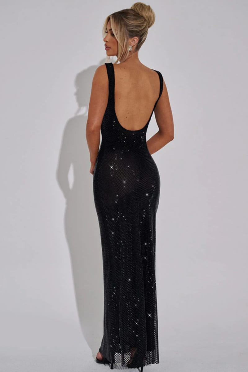 black sequined evening gown with deep back cutout and shimmering star-like embellishments shown from the back side of the sequin square neck bodycon maxi sling dress