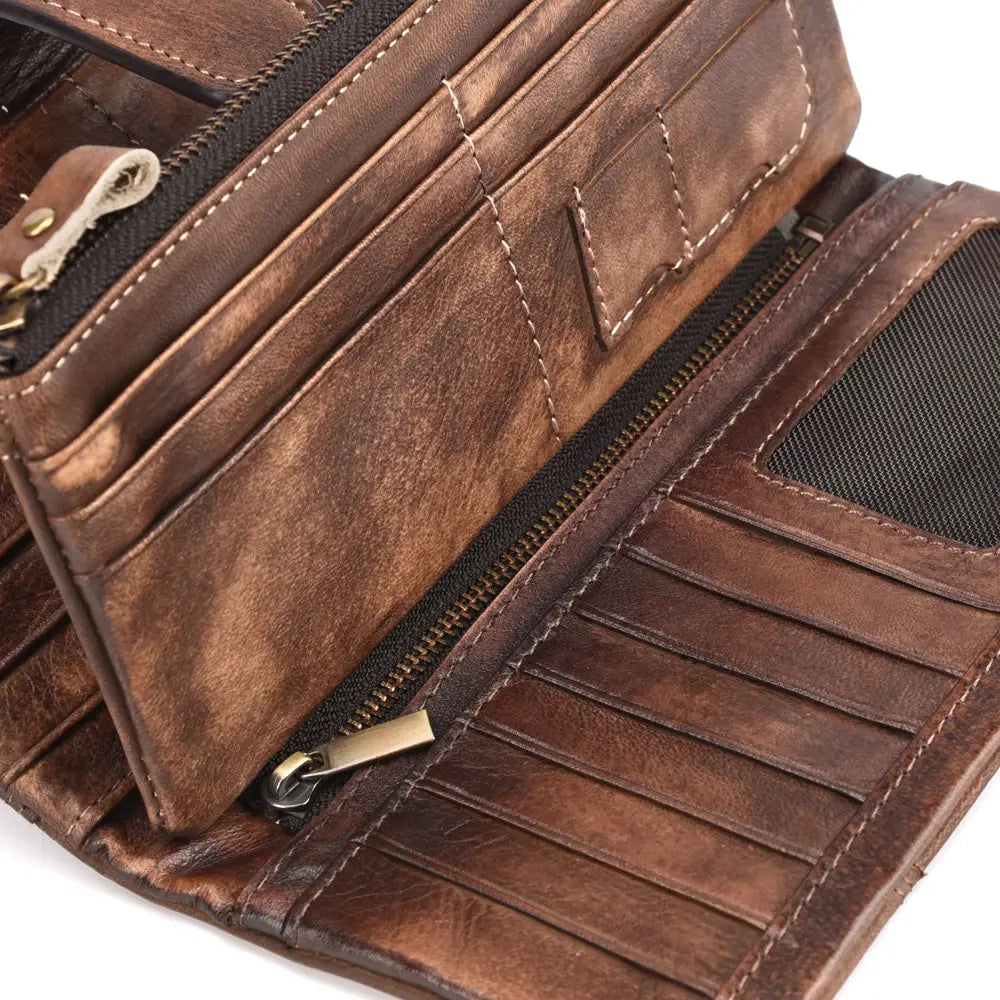 A brown leather long wallet with vintage stitching, multiple card slots, and a zipper compartment.