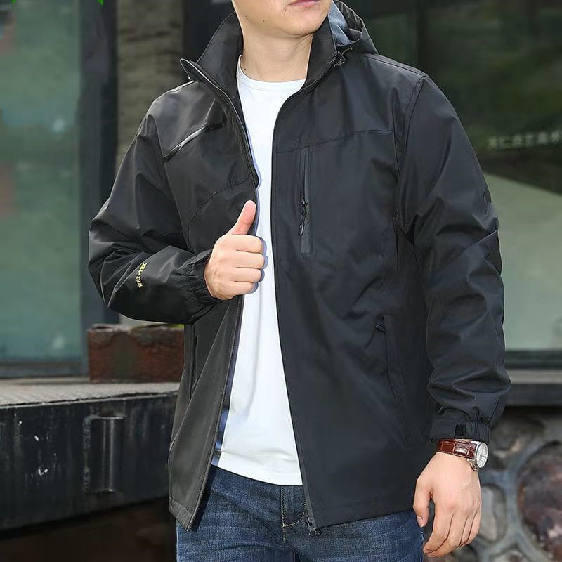 black waterproof men’s hiking jacket with hood and zippered pockets designed for outdoor protection