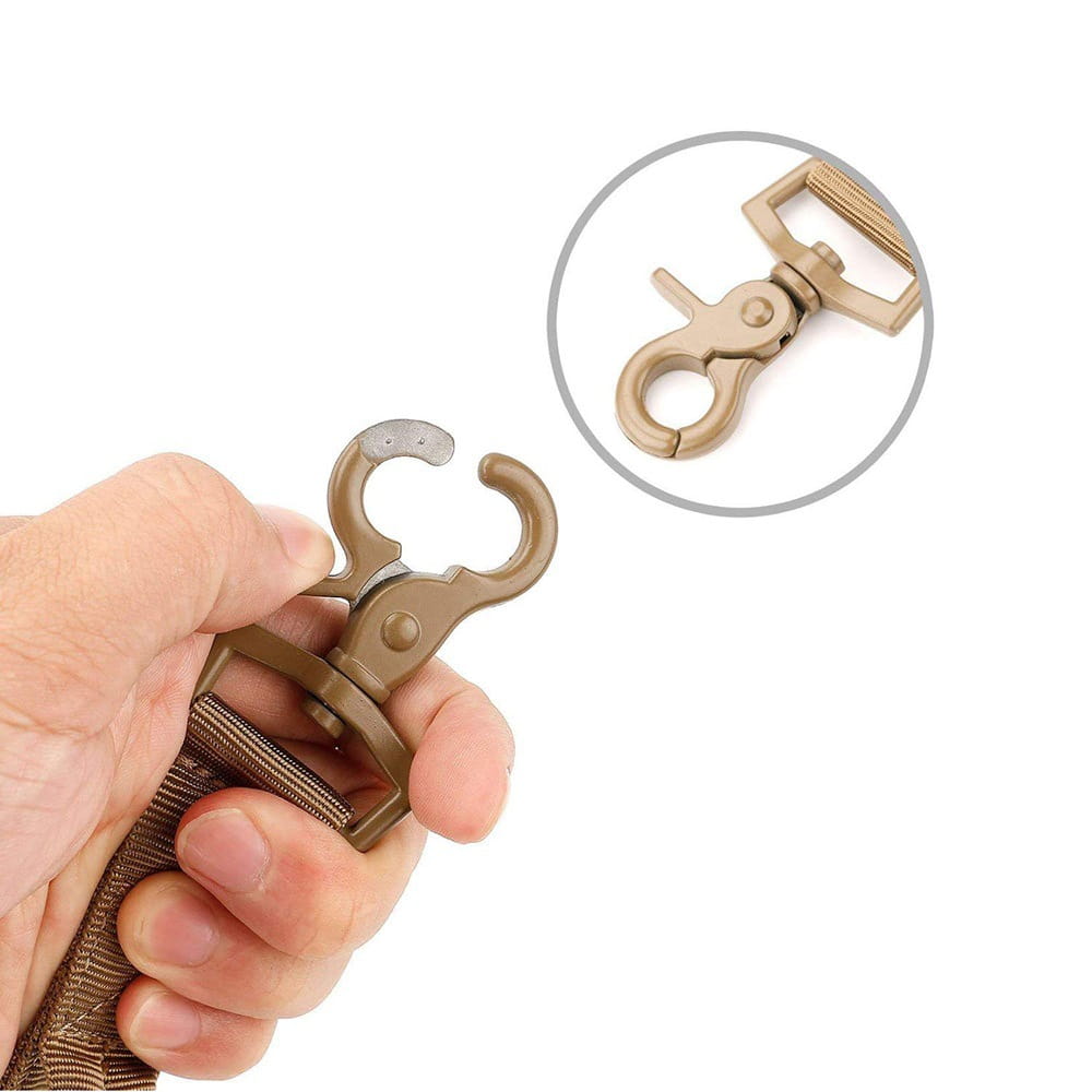 tactical bungee dog leash featuring a tan tactical webbing strap with a matching tan metal quick-release buckle and d-ring attachment for secure and elastic pet control.