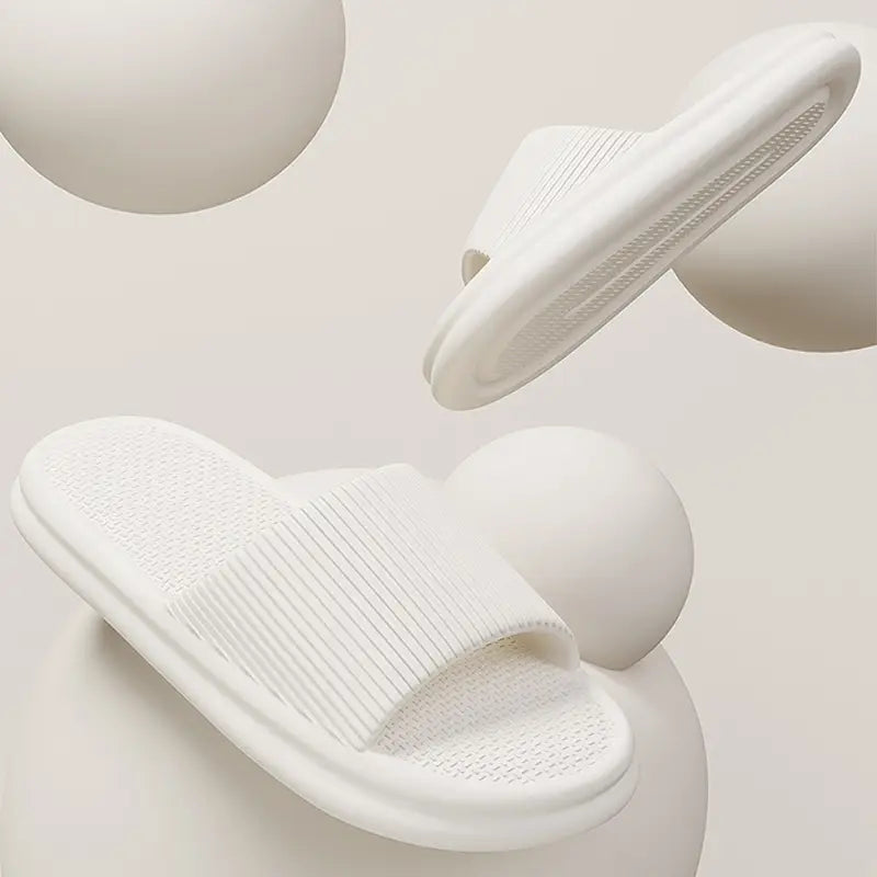 white slip-on unisex ribbed anti slip eva house slippers with a textured sole and ribbed strap