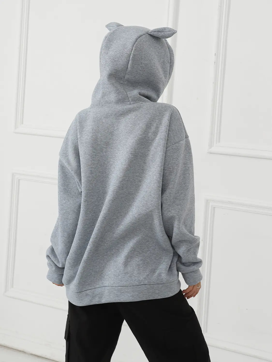women’s gray hooded sweatshirt with dalmatian print and cat ear accents designed for casual wear