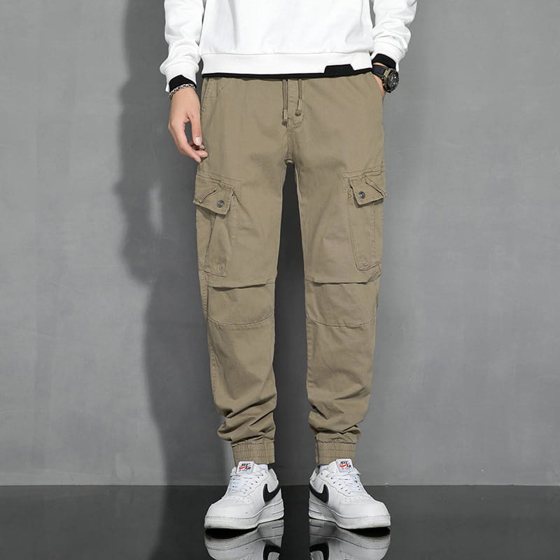 Khaki Japanese retro multipocket casual cargo trousers featuring multiple pockets and a drawstring waistband designed for practical everyday wear.