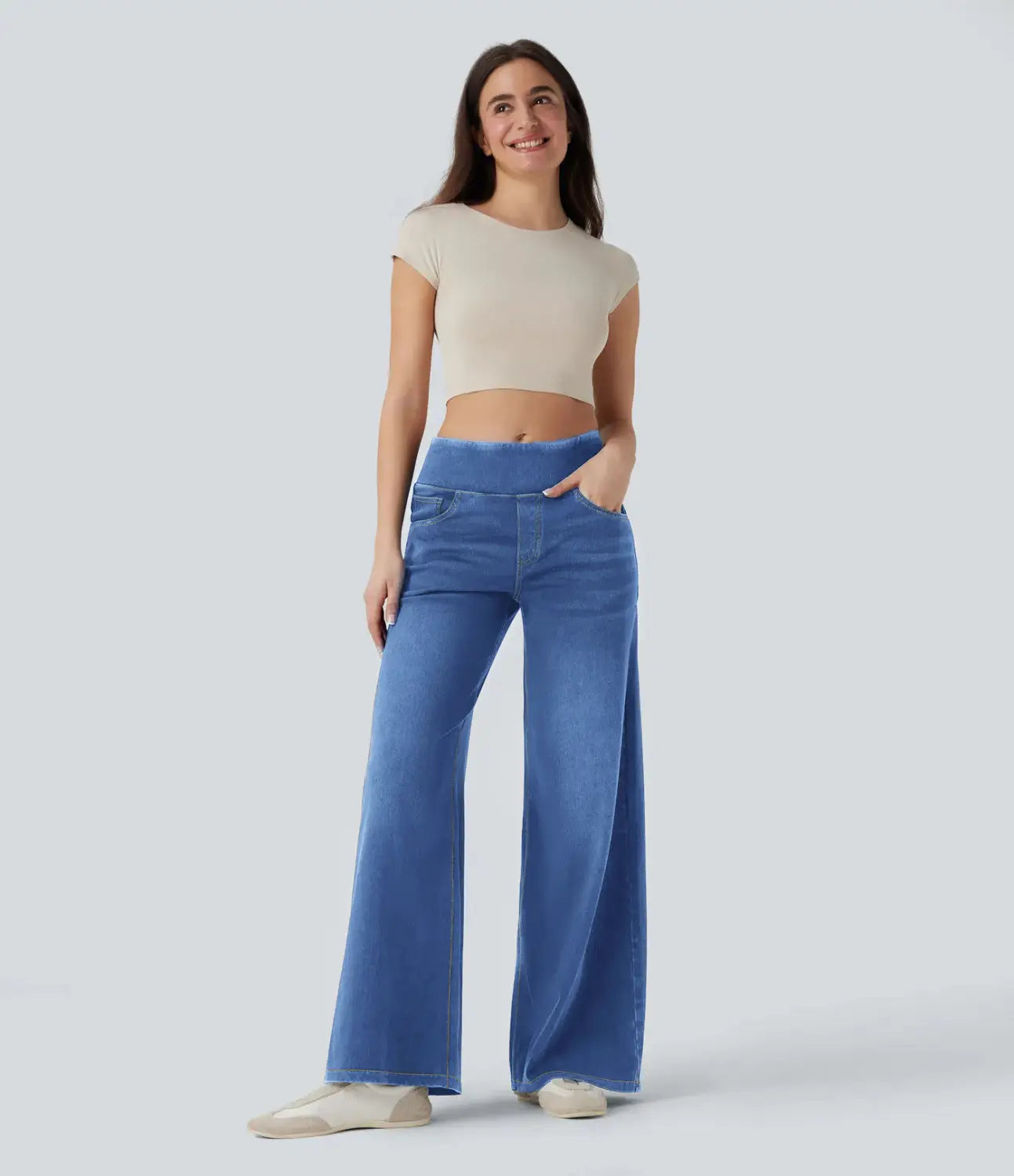 Wide leg stretchy high waisted jeans in blue denim with a high waist and subtle fading