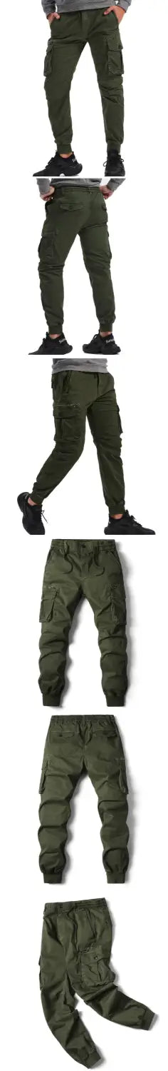 Men’s slim fit olive green cotton cargo work pants featuring multiple pockets and a tapered fit.