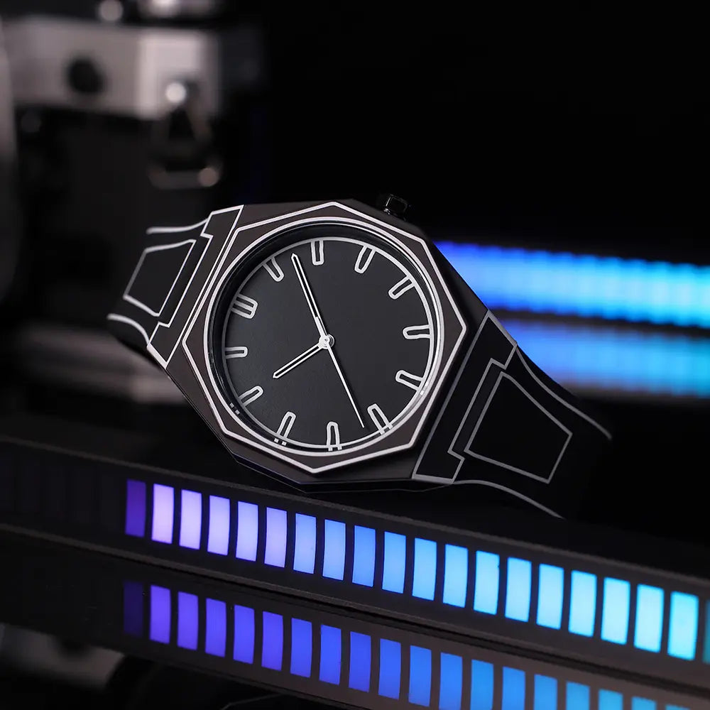 Modern octagonal minimalist waterproof silicone watch in black featuring a sleek design with white hour markers and hands on a dark face.