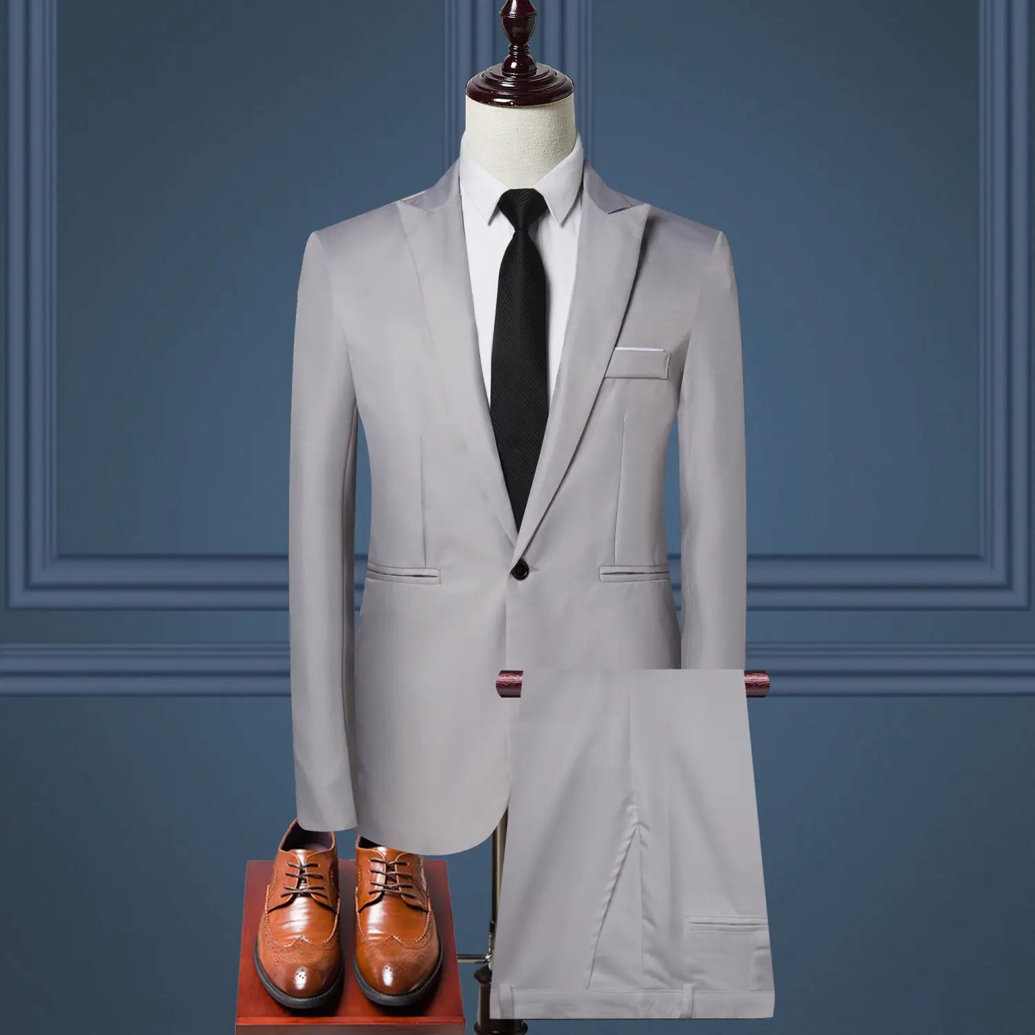 A sleek light gray men solid color two piece leisure suit featuring a single-breasted design and notched lapels.