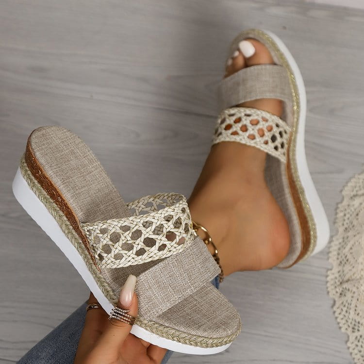 Beige woven mesh espadrille platform wedge slide sandals with a white rubber sole and gold-tone metal accents for women.