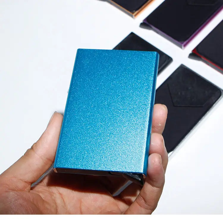 a sleek matte-finish blue metallic minimalist rfid blocking aluminum multi card wallet with a rectangular design