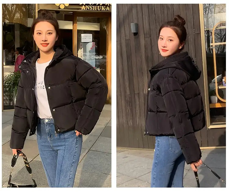 Black women hooded short down jacket with quilted design and puffer material shown from the back side