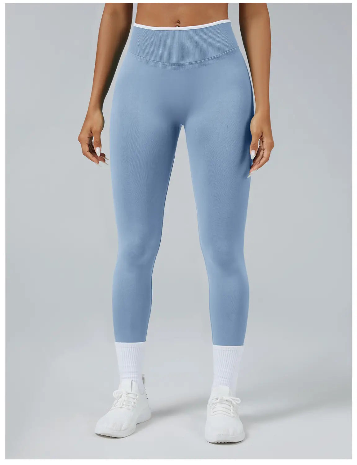 Light blue seamless high waist sports yoga leggings with a ribbed white waistband.