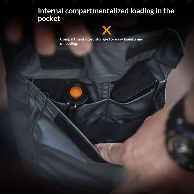 Black tactical flashlight with orange lens and metallic accents designed for secure compartmentalized storage showcased with tactical cargo pants multiple pockets men summer.